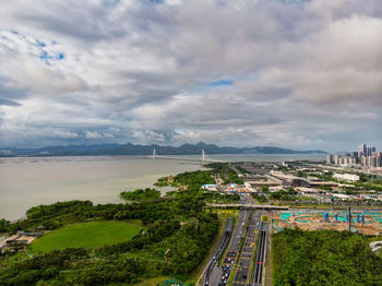 High angle view of bridge over city against sky