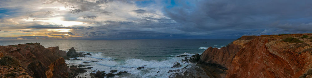 Panoramic view of sea against sky during sunset