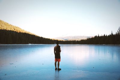 Woman standing in water