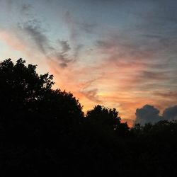 Scenic view of cloudy sky at sunset