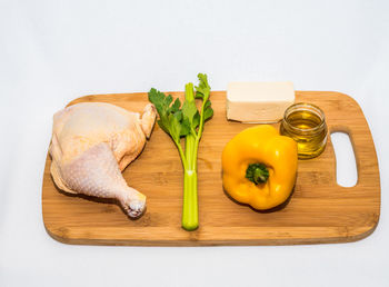Close-up of vegetables on table against white background