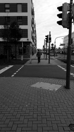 Street in city against sky