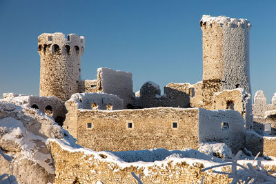 Old ruin building against clear sky