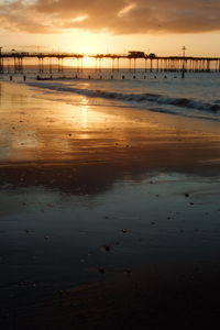 Scenic view of beach during sunset