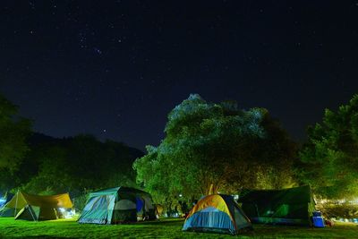 Romantic starry sky night view at forest. campsite with spectacular starry sky