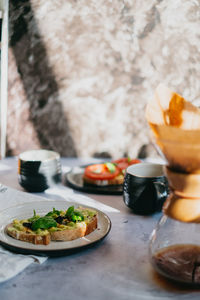 Close-up of breakfast served on table