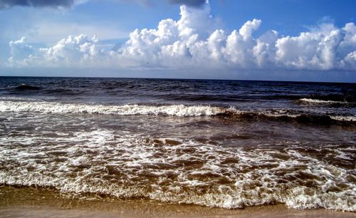 Scenic view of seascape against cloudy sky