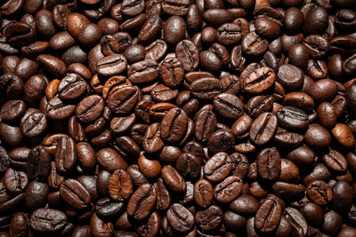 Roasted coffee beans used as for a background