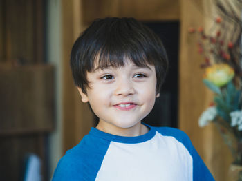 Portrait of cute boy at home