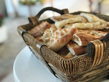 Close-up of bread in basket on table