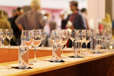Close-up of wine glasses on table at restaurant