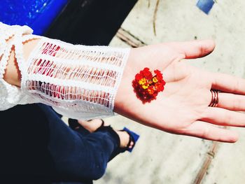 High angle view of woman holding hands