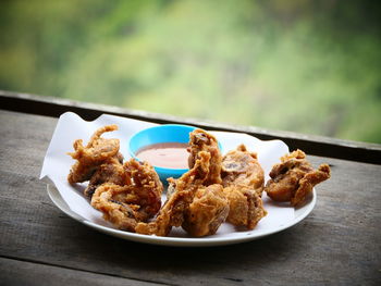 Close-up of food served on table