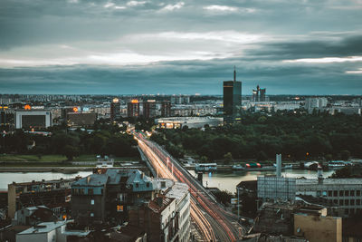 High angle view of buildings in city against sky