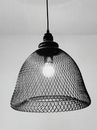 Low angle view of illuminated lamp