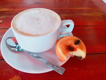 Close-up of coffee cup on table