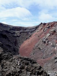 Scenic view of volcanic crater against sky