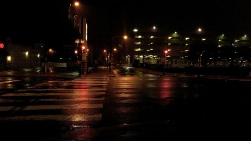 Illuminated street lights at night