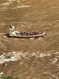 People on boat in sea