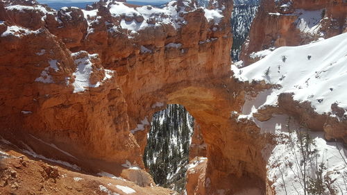 View of rock formation in snow