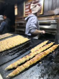Close-up of man preparing food