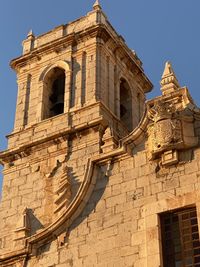 Low angle view of historical building against sky