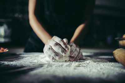 Close-up of person preparing food