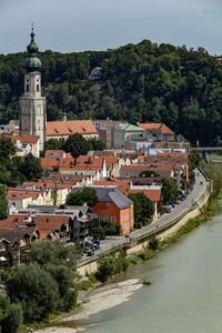 Buildings in town against clear sky