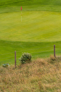 High angle view of golf course on field