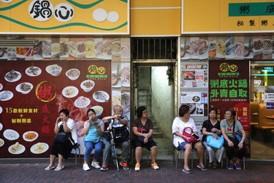 Group of people in front of building