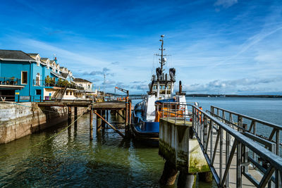 Pier over sea against sky