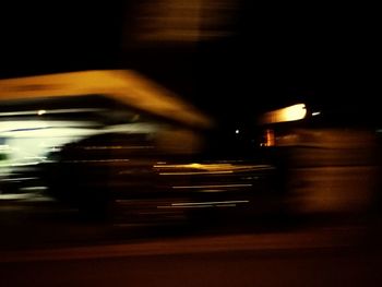 Blurred motion of light trails on street at night