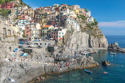 View of village houses  and sea bay of  manarola village at cinque terre area,  italy,  june, 2019.