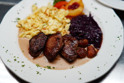 High angle view of food served in plate