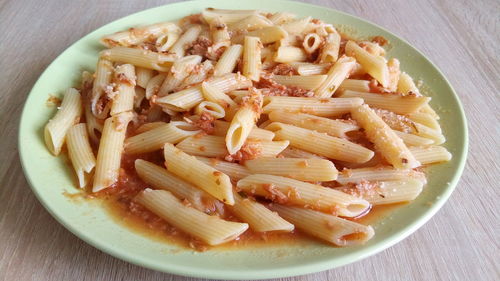 High angle view of pasta in plate on table