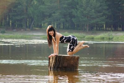 Young woman in lake