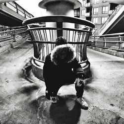 Man with dog on street during winter