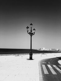 Low angle view of street light against clear sky