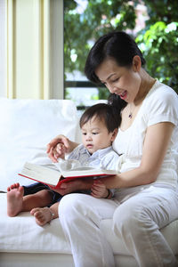 Couple holding book