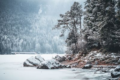 Scenic view of snow covered land during winter