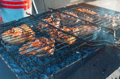 Close-up of meat on barbecue grill