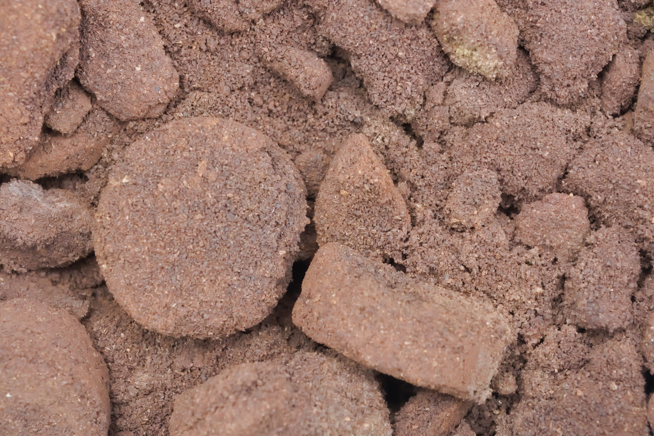 FULL FRAME SHOT OF ROCKS ON GROUND