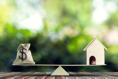 Close-up of birdhouse on table