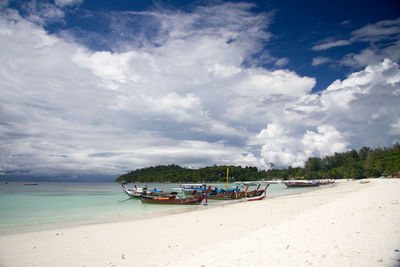 Panoramic view of beach against cloudy sky