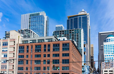 Various city skyscrapers rise up in seattle, washington.