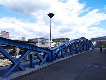 Bridge against sky in city