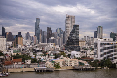 Buildings in city against sky