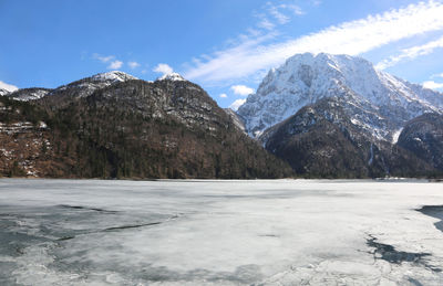 Scenic view of snowcapped mountains against sky