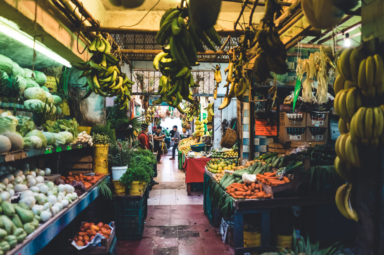 VEGETABLES FOR SALE IN MARKET STALL AT STREET