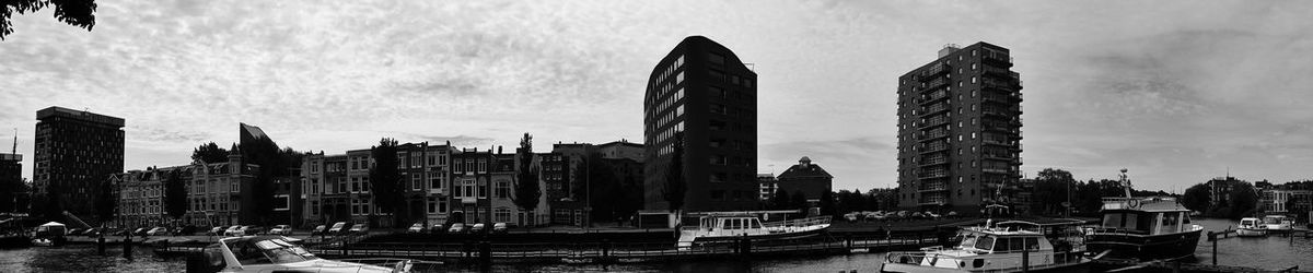Buildings in city against sky